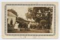 Primary view of [Photograph of Mrs. King in Her Oak Cliff Backyard]