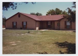 Primary view of object titled '[Photograph of New Haker Home Built in 1983]'.