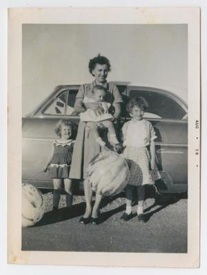 [Photograph of Mrs. Nelson With Three Children]