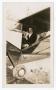 Photograph: [Woman in Small Plane]