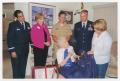 Thumbnail image of item number 1 in: '[Helen Snapp showing Her WASP Jacket to Congresswoman Ileana Ros-Lehtinen]'.