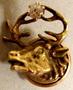 Physical Object: [Gold pin in the shape of wild game with large antlers, antlers are h…