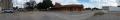 Thumbnail image of item number 1 in: 'Panoramic image of the parking lot across from the train depot in Gainesville, Texas'.