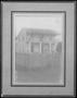 Thumbnail image of item number 1 in: '[A man standing at the northeast corner of a white two story house]'.