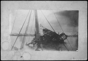 Primary view of object titled '[Ship wrecked in a harbor]'.