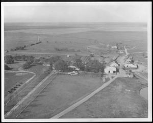 Primary view of object titled '[Aerial photograph of the house and the driveway at George Ranch]'.