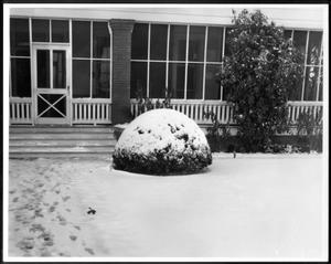 [Front screened porch of the George Ranch house covered in snow]