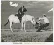 Photograph: [WASP Trainee Mounting a Horse]