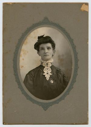 [Photograph of an Older Woman in Dark Clothing]