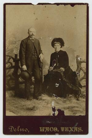 [Portrait of a Man and Woman Dressed in Dark Clothing]