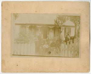 [Photograph of a Family in Front of Their House]