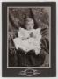 Photograph: [Photograph of Infant J. P. Baugh With Flowers #2]
