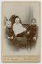 Primary view of [Photograph of Three Young Boys Sitting]