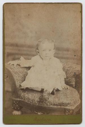 [Photograph of Young Child on a Seat]