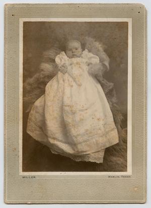 Primary view of object titled '[Photograph of an Infant in a Large Dress]'.