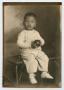 Photograph: [Portrait of a Young African-American Boy With a Ball]