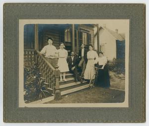 [Photograph of Nellie Alexander Outside of a Porch With Friends]