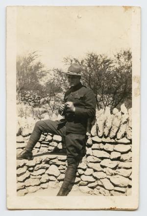 Primary view of object titled '[Photograph of D. F. Draper Reclining on a Rock Wall]'.