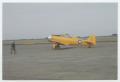 Primary view of [Brown in Plane on Runway]