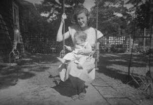 [Woman and Baby in Swing]