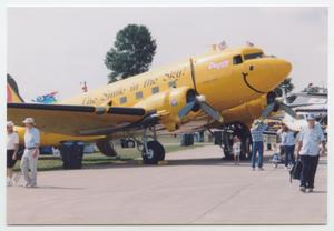 Primary view of object titled '[Yellow Plane at Air Show]'.