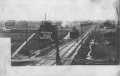 Postcard: [Railroad yard looking West, Rosenberg, Texas]