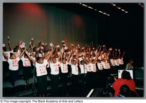 Primary view of object titled '[Young choir members holding arms in the air]'.