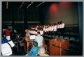 Photograph: [Choir and musicians on stage]