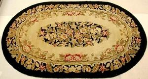 Primary view of object titled '[Oval shaped rug]'.