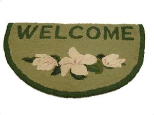 [Halfmoon shape,"Welcome",white floral design on green]