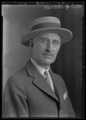 [Portrait of Man in Hat and Glasses]