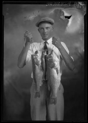 [Portrait of Man Holding Fish]