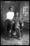 Photograph: [Portrait of Two Young Men Wearing Hats]