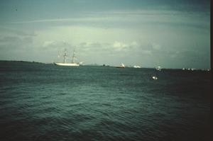 [Pier 19, (Barque Elissa beign towed out of Galveston Bay)]