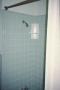 Photograph: [Connelly-Yerwood House, (shower in green tile bathroom)]