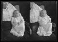 Photograph: [Portraits of Baby in Woman's Lap]