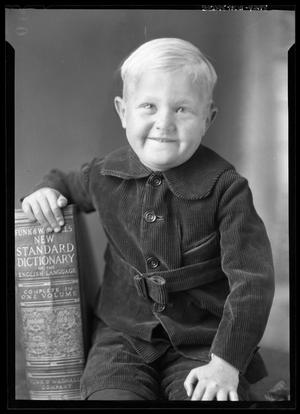 [Portrait of Boy with Book]