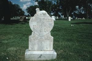 [Llano Cemetery, (infant monument, carved marble lamb & heart)]