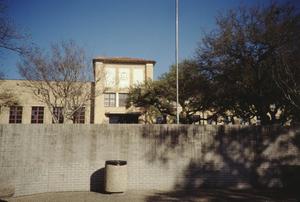 [University Junior High School, (view from San Jacinto St w/ wall)]