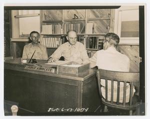 [Photograph of the Judge Advocate and Two Soldiers]