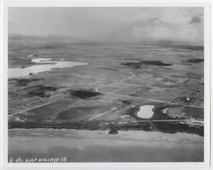 Primary view of object titled '[Copy Print of an Aerial View of Camp Hulen and Rain Shower]'.