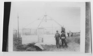 Primary view of object titled '[Copy of a Negative Photo of Soldiers by a Tent]'.