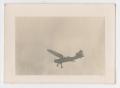 Thumbnail image of item number 1 in: '[Photograph of a Douglas 0-43A Airplane Above Camp Hulen]'.