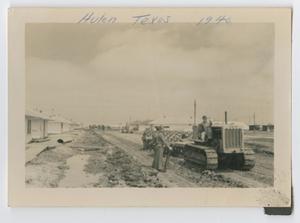 Primary view of object titled '[Photograph of a Road Grader at Camp Hulen]'.